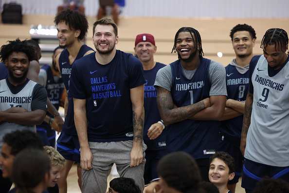Dallas Mavericks players helping with a youth clinic in NYU Abu Dhabi.