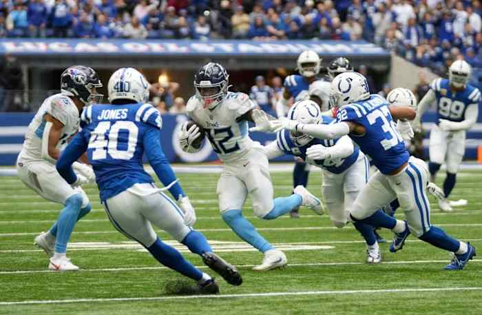 Tennessee Titans running back Tyjae Spears (32) runs the ball on Sunday, Oct. 8, 2023, during a game against the Indianapolis Colts at Lucas Oil Stadium in Indianapolis.