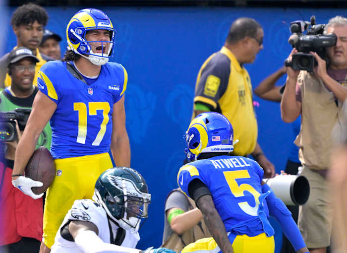 Nacua celebrates a touchdown with fellow receiver Tutu Atwell.
