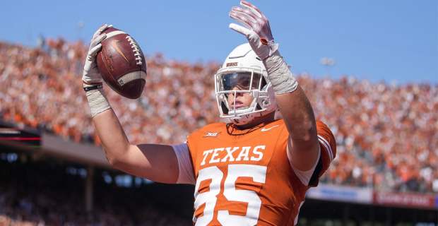 Texas Longhorns tight end Gunnar Helm celebrates a touchdown during a college football game.