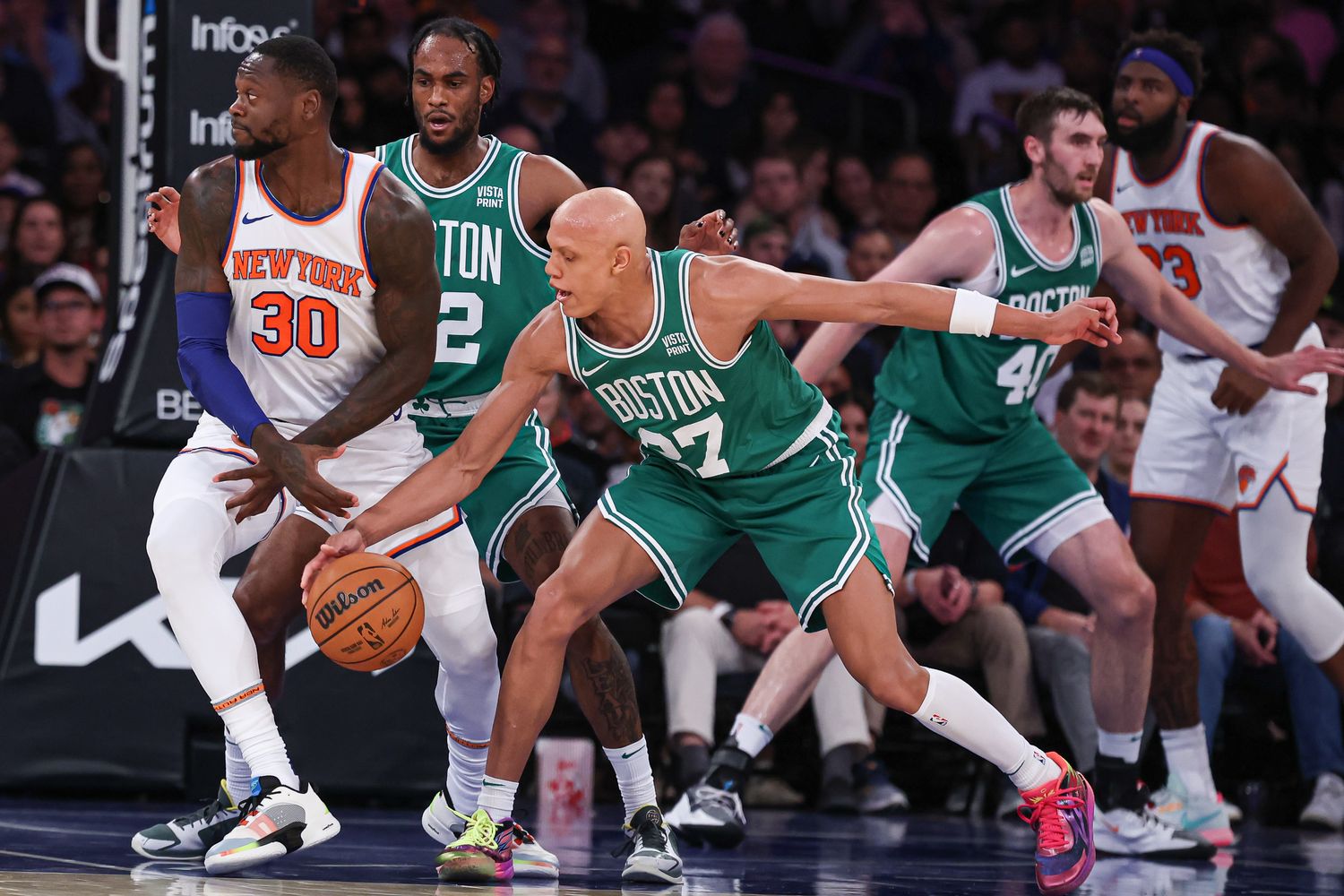 Boston Celtics guard Jordan Walsh (27) steals the ball from New York Knicks forward Julius Randle (30) during the first half at Madison Square Garden.
