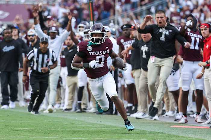 Texas A&M Aggies WR Ainias Smith scoring a touchdown against Alabama. (Photo by Troy Taormina of USA Today Sports)