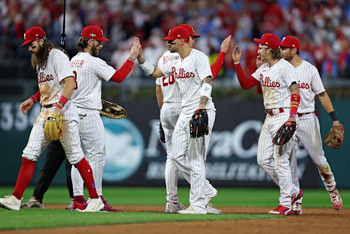 Oct 11, 2023; Philadelphia, Pennsylvania, USA; The Philadelphia Phillies celebrate after beating the Atlanta Braves in game three of the NLDS for the 2023 MLB playoffs at Citizens Bank Park. Mandatory Credit: Bill Streicher-USA TODAY Sports  