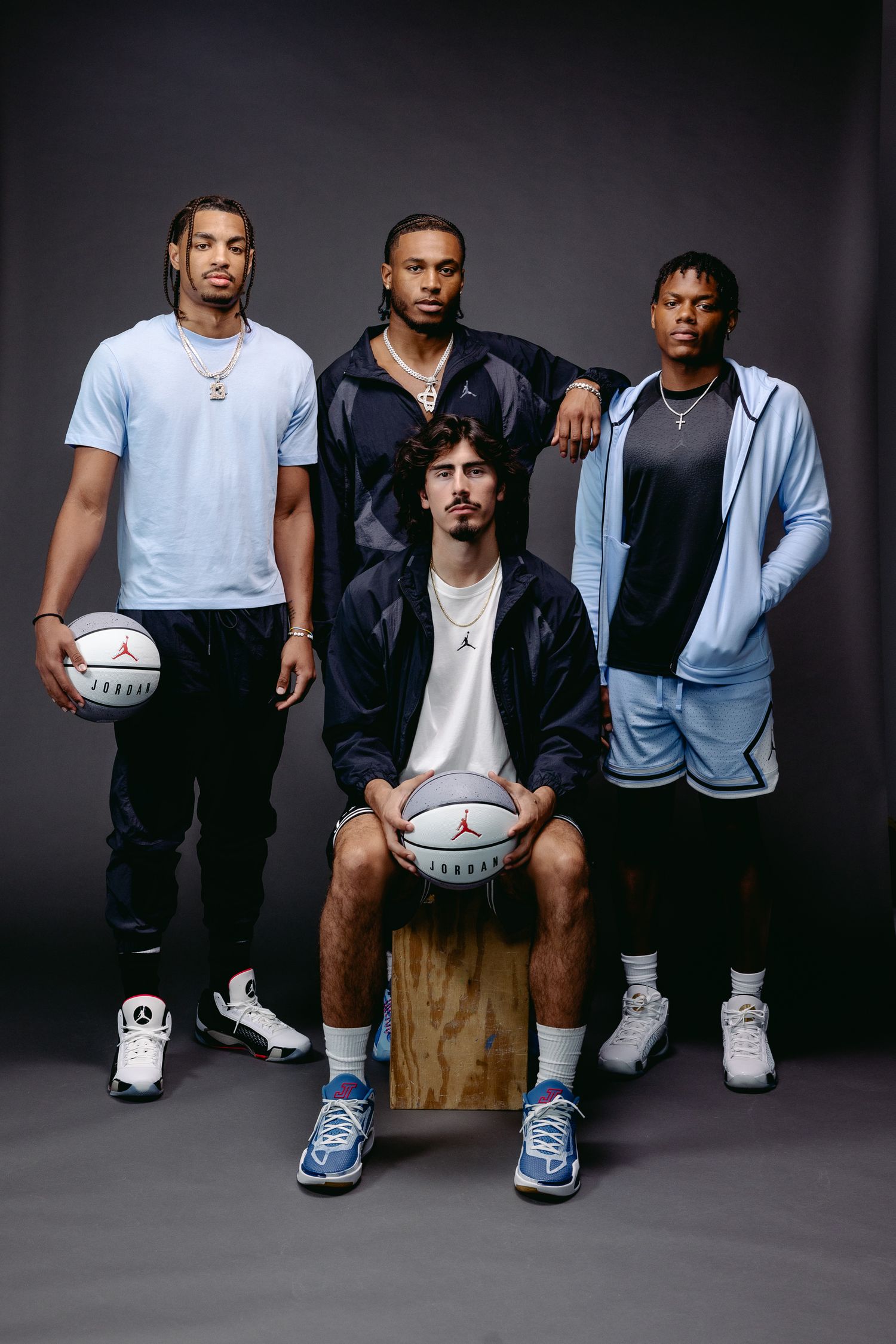 Marcus Sasser, Cam Whitmore, Jaime Jaquez Jr., and Jett Howard pose together for a Jordan Brand photo shoot.