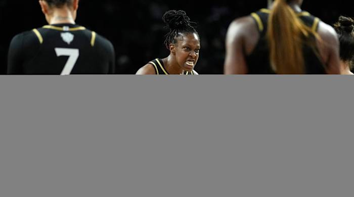Las Vegas Aces guard Chelsea Gray celebrates after a play against the New York Liberty during the WNBA Finals.