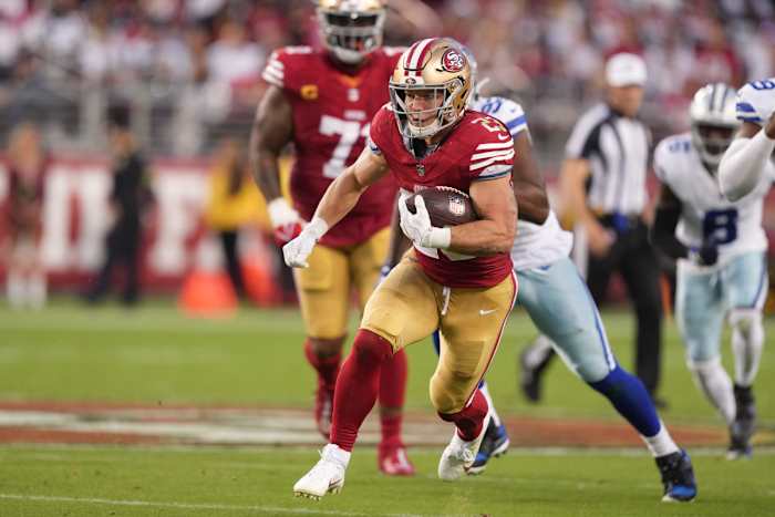 Oct 8, 2023; Santa Clara, California, USA; San Francisco 49ers running back Christian McCaffrey (23) carries the ball against the Dallas Cowboys during the second quarter at Levi's Stadium. Mandatory Credit: Darren Yamashita-USA TODAY Sports  