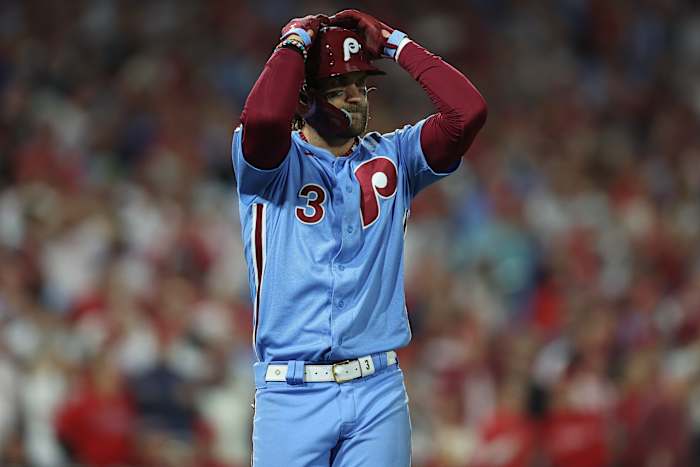 Oct 12, 2023; Philadelphia, Pennsylvania, USA; Philadelphia Phillies first baseman Bryce Harper (3) reacts after flying out against the Atlanta Braves during the seventh inning during game four of the NLDS for the 2023 MLB playoffs at Citizens Bank Park.