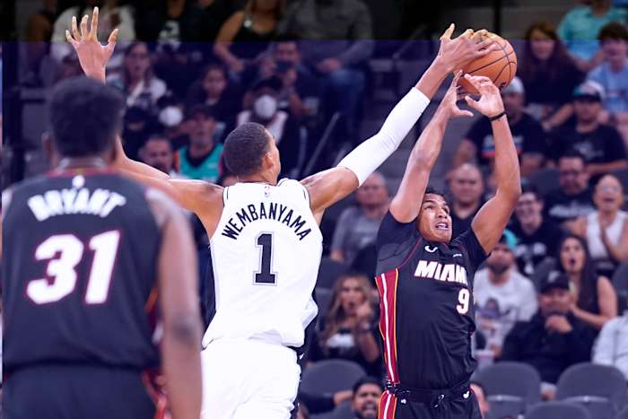 San Antonio Spurs center Victor Wembanyama (1) blocks the shot attempted by Miami Heat guard Dru Smith (9) during the first half at Frost Bank Center.