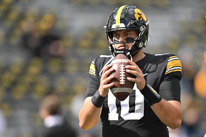 Oct 7, 2023; Iowa City, Iowa, USA; Iowa Hawkeyes quarterback Deacon Hill (10) warms up before the game against the Purdue Boilermakers at Kinnick Stadium. Mandatory Credit: Jeffrey Becker-USA TODAY Sports