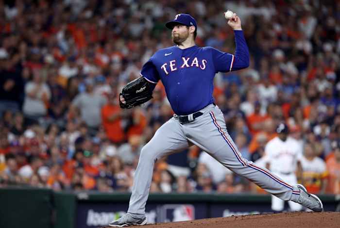 Oct 15, 2023; Houston, Texas, USA; Texas Rangers pitcher Jordan Montgomery (52) throws during the first inning of game one of the ALCS against the Houston Astros in the 2023 MLB playoffs at Minute Maid Park. Mandatory Credit: Troy Taormina-USA TODAY Sports