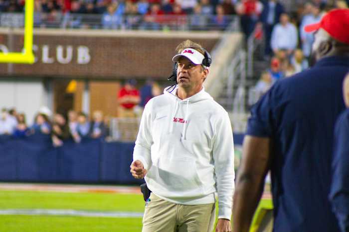Ole Mis Rebels coach Lane Kiffin on the sideline versus the Arkansas Razorbacks (2023).