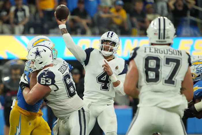 Oct 16, 2023; Inglewood, California, USA; Dallas Cowboys quarterback Dak Prescott (4) carries the ball against the Los Angeles Chargers in the second half at SoFi Stadium.