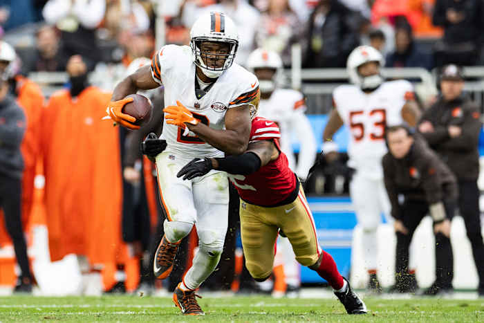Oct 15, 2023; Cleveland, Ohio, USA; Cleveland Browns wide receiver Amari Cooper (2) runs the ball as San Francisco 49ers cornerback Deommodore Lenoir (2) pulls him down from behind during the fourth quarter at Cleveland Browns Stadium. Mandatory Credit: Scott Galvin-USA TODAY Sports