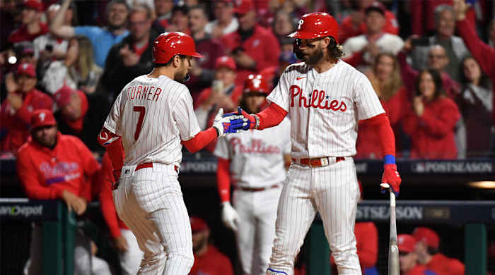 Phillies’ Trea Turner celebrates his home run with Bryce Harper in NLCS Game 2 vs. the Diamondbacks.