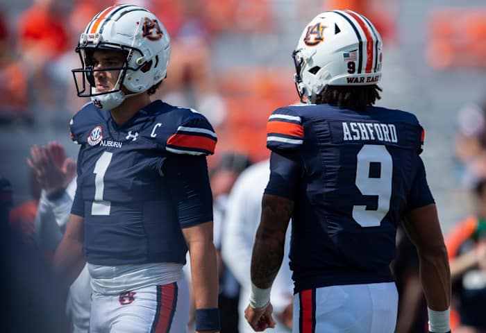 Auburn Tigers quarterback Payton Thorne (1) and quarterback Robby Ashford (9) warm up before Auburn Tigers take on Georgia Bulldogs at Jordan-Hare Stadium in Auburn, Ala., on Saturday, Sept. 30, 2023.