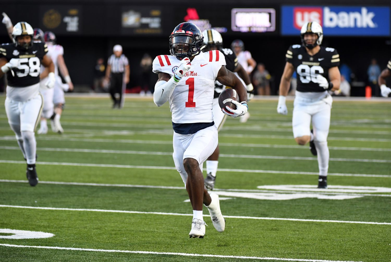Oct 8, 2022; Nashville, Tennessee, USA; Mississippi Rebels wide receiver Jonathan Mingo (1) runs for a touchdown after a reception against the Vanderbilt Commodores during the second half at FirstBank Stadium. Mandatory Credit: Christopher Hanewinckel-USA TODAY Sports