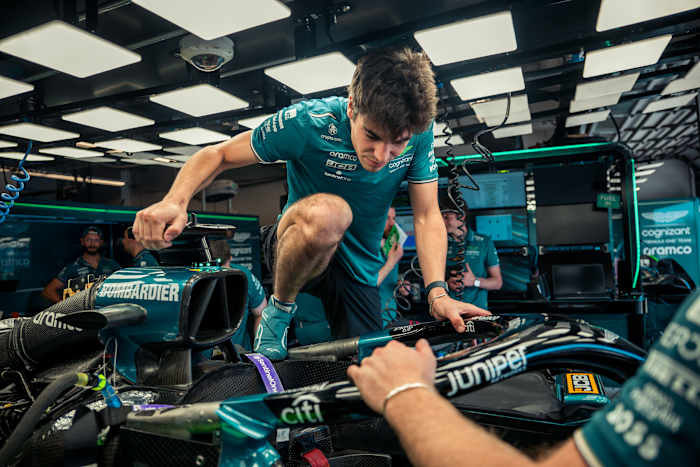 lance stroll aston martin getting into car