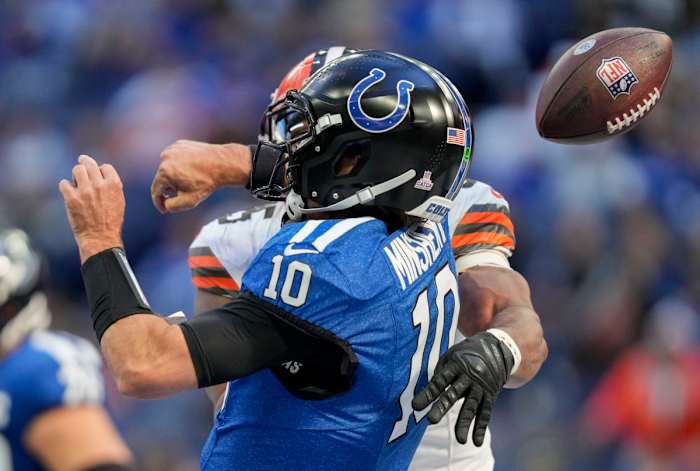Oct 22, 2023; East Rutherford, New Jersey, USA; Cleveland Browns defensive end Myles Garrett (95) sacks Indianapolis Colts quarterback Gardner Minshew II (10) on during a game against the Cleveland Browns at Lucas Oil Stadium.