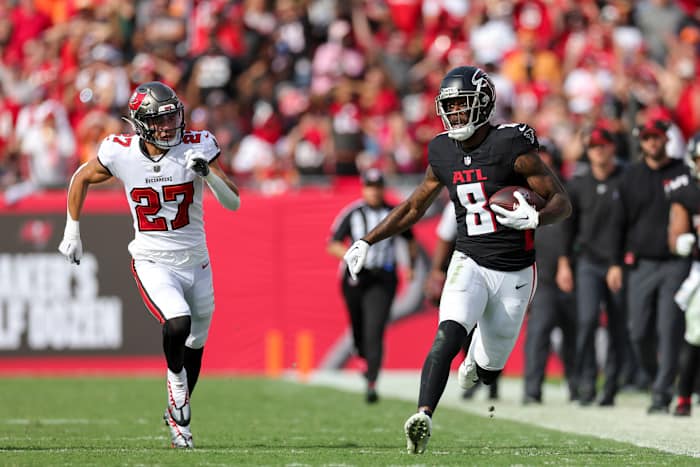 Oct 22, 2023; Tampa, Florida, USA; Atlanta Falcons tight end Kyle Pitts (8) is chased out of bounds by Tampa Bay Buccaneers cornerback Zyon McCollum (27) in the fourth quarter at Raymond James Stadium.