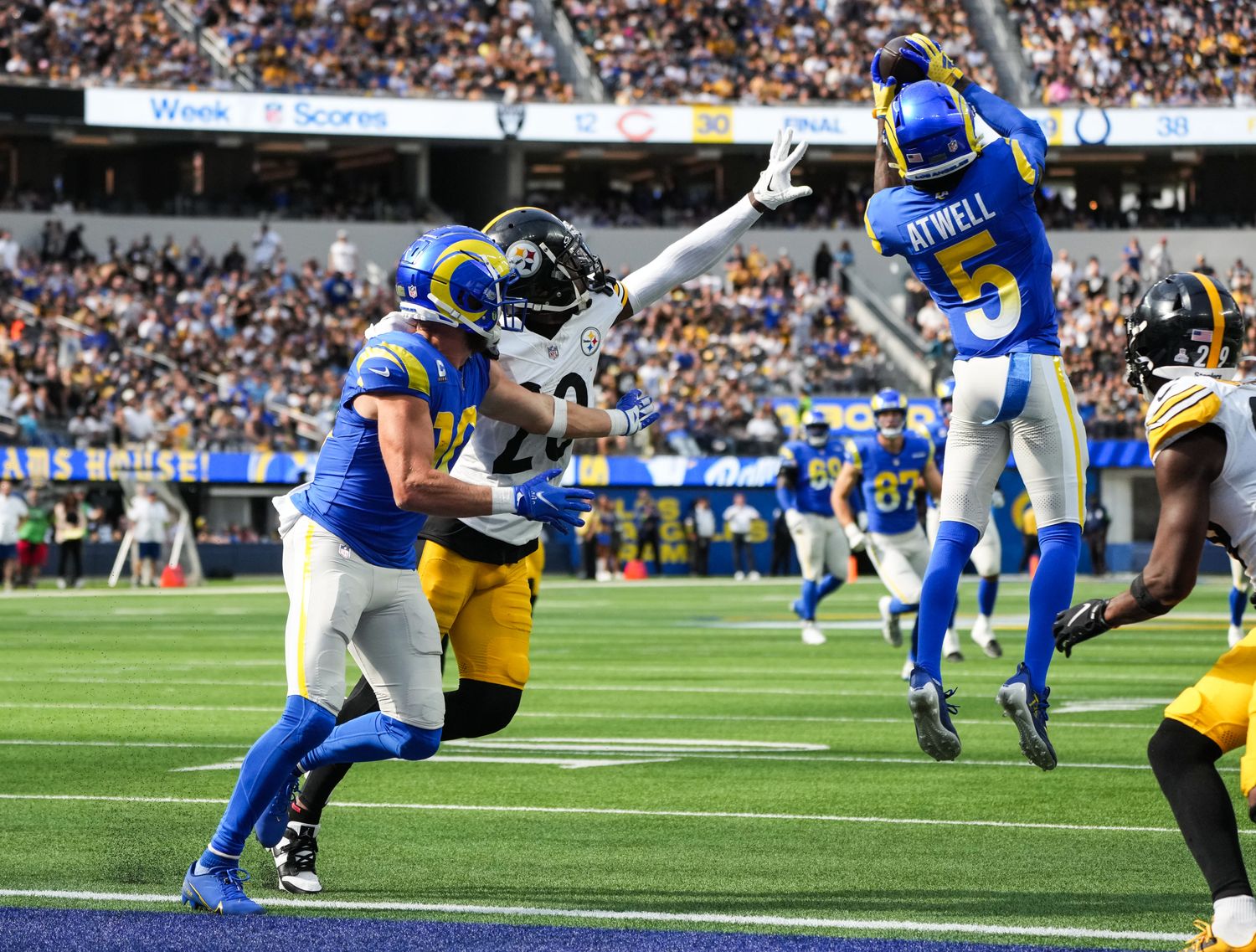 Oct 22, 2023; Inglewood, California, USA; Los Angeles Rams wide receiver Tutu Atwell (5) catches a touchdown pass against the Pittsburgh Steelers in the first half at SoFi Stadium. Mandatory Credit: Kirby Lee-USA TODAY Sports