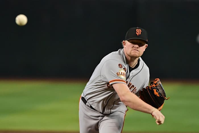 SF Giants starting pitcher Logan Webb (62) throws a pitch against the Arizona Diamondbacks (2023).
