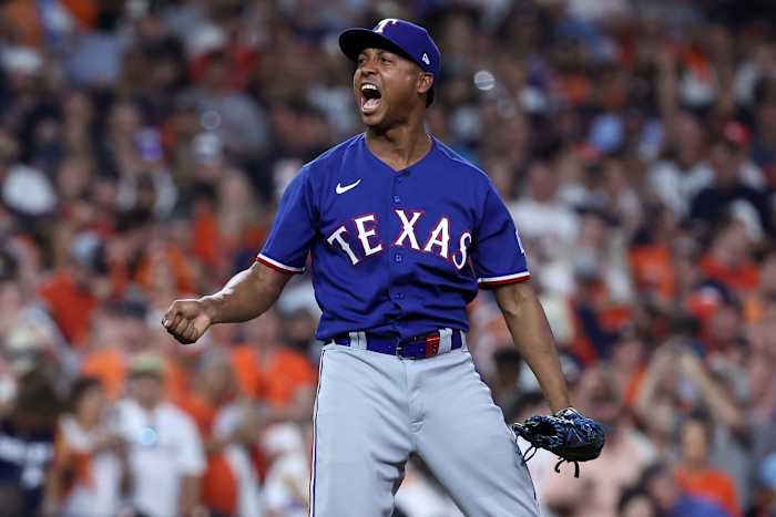 Texas Rangers relief pitcher Jose Leclerc reacts after striking out Houston Astros pinch-hitter Jon Singleton to end the eighth inning during Game 6 of the ALCS Sunday night at Minute Maid Park.