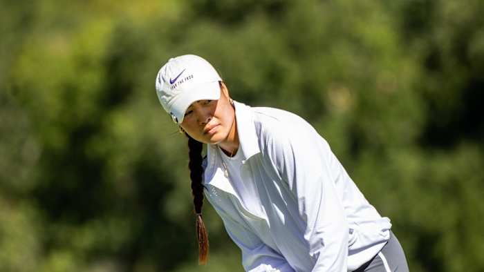 Lois Lau Lines up a putt at the Jim West Invitational