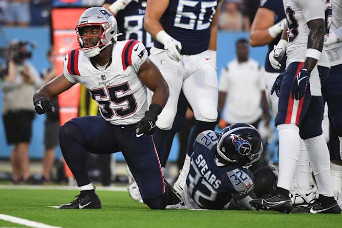 Aug 25, 2023; Nashville, Tennessee, USA; New England Patriots linebacker Josh Uche (55) tackles Tennessee Titans running back Tyjae Spears (32) for a loss during the first half at Nissan Stadium.
