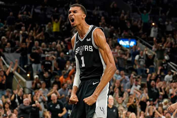 Oct 27, 2023; San Antonio, Texas, USA; San Antonio Spurs forward Victor Wembanyama (1) reacts after dunking during the second half against the Houston Rockets at Frost Bank Center.