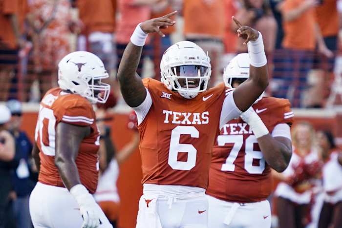 Texas Longhorns quarterback Maalik Murphy (6) reacts after throwing a touchdown pass during the first half against the Brigham Young Cougars at Darrell K Royal-Texas Memorial Stadium.
