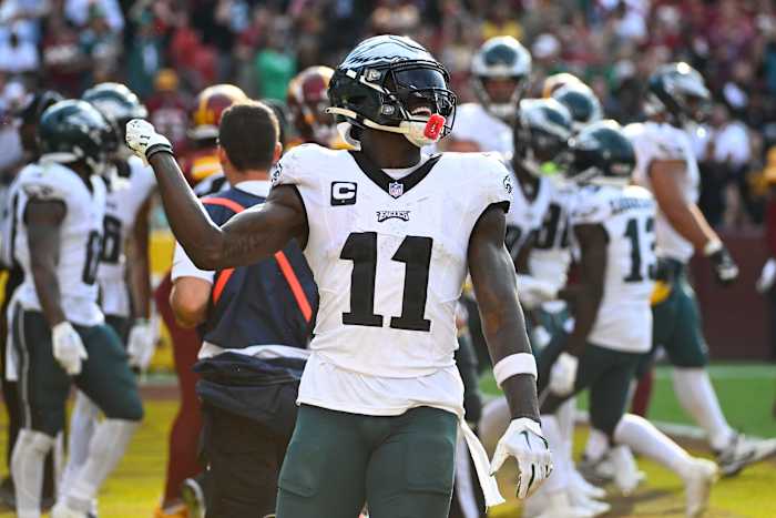 Philadelphia Eagles wide receiver A.J. Brown (11) celebrates after a touchdown against the Washington Commanders during the second half at FedExField.