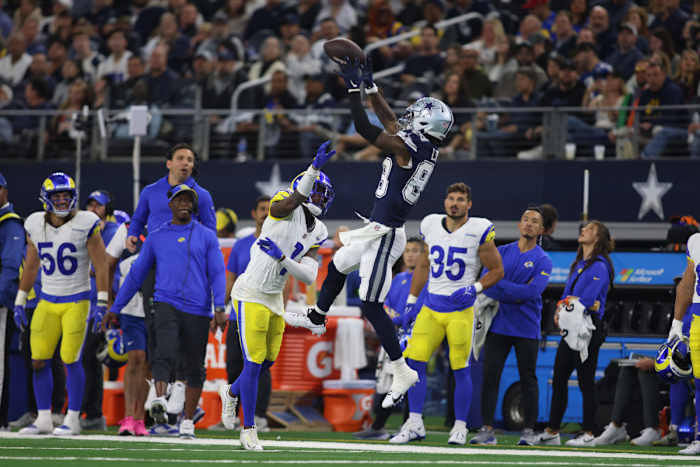 Oct 29, 2023; Arlington, Texas, USA; Dallas Cowboys wide receiver CeeDee Lamb (88) catches a pass against Los Angeles Rams cornerback Derion Kendrick (1) in the third quarter at AT&T Stadium. Mandatory Credit: Tim Heitman-USA TODAY Sports