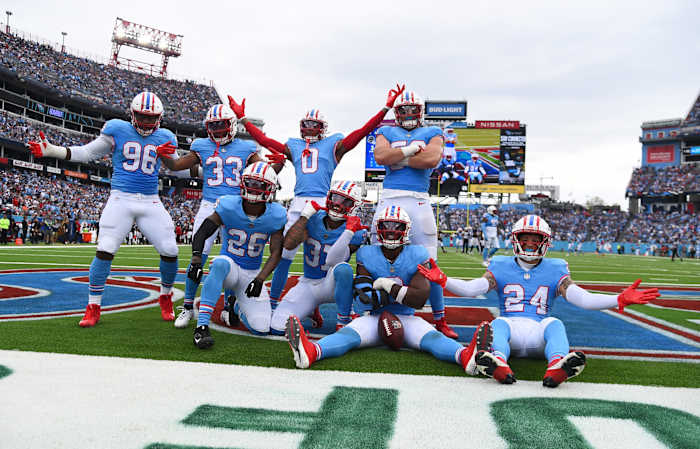 Tennessee Titans defenders celebrate after a turnover during the first half against the Atlanta Falcons at Nissan Stadium.
