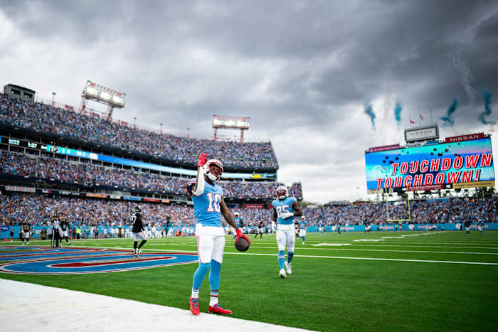 Tennessee Titans wide receiver DeAndre Hopkins (10) celebrates his touchdown against the Atlanta Falcons during the third quarter at Nissan Stadium.