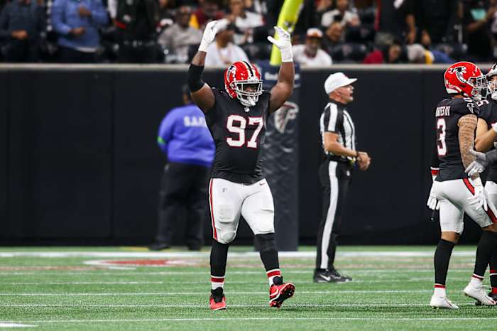 Oct 15, 2023; Atlanta, Georgia, USA; Atlanta Falcons defensive end Grady Jarrett (97) reacts on the field against the Washington Commanders in the second quarter at Mercedes-Benz Stadium.