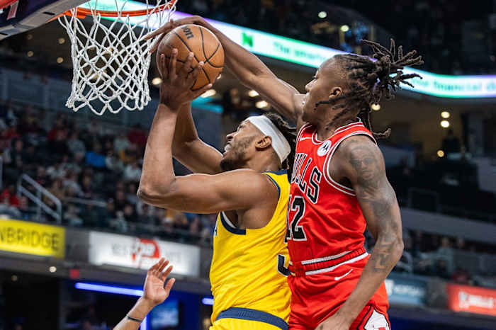 Indiana Pacers center Myles Turner (33) shoots the ball while Chicago Bulls guard Ayo Dosunmu (12) defends in the second half at Gainbridge Fieldhouse.