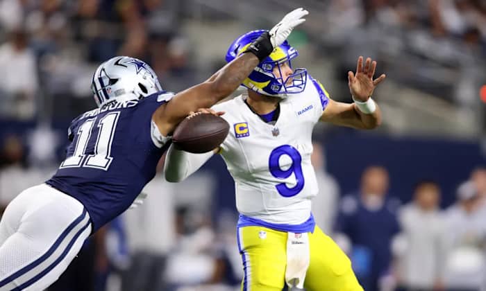 Cowboys edge rusher Micah Parsons hits Los Angeles Rams quarterback Matthew Stafford.