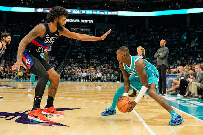 Detroit Pistons forward Marvin Bagley III defends Charlotte Hornets guard Terry Rozier.