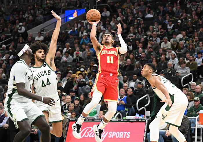 Atlanta Hawks guard Trae Young shoots against the Milwaukee Bucks