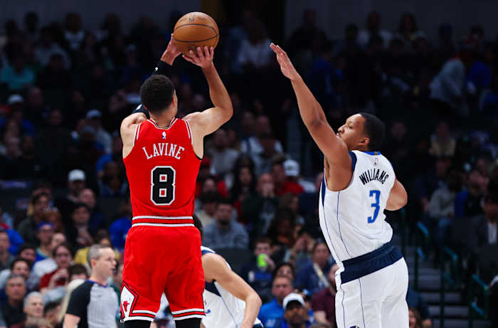 Chicago Bulls star Zach LaVine shoots over Dallas Mavericks' Grant Williams.