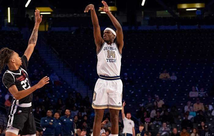 Kowacie Reeves shooting a basketball vs Clark Atlanta