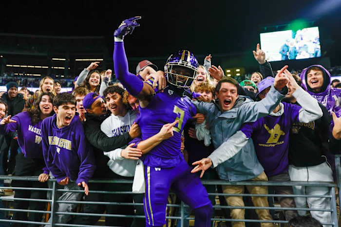 Oct 21, 2023; Seattle, Washington, USA; Washington Huskies safety Mishael Powell (3) celebrates with fans in the student section following a 15-7 victory against the Arizona State Sun Devils at Alaska Airlines Field at Husky Stadium.