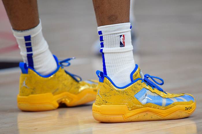 Los Angeles Clippers guard Russell Westbrook's blue and gold Jordan Brand shoes.