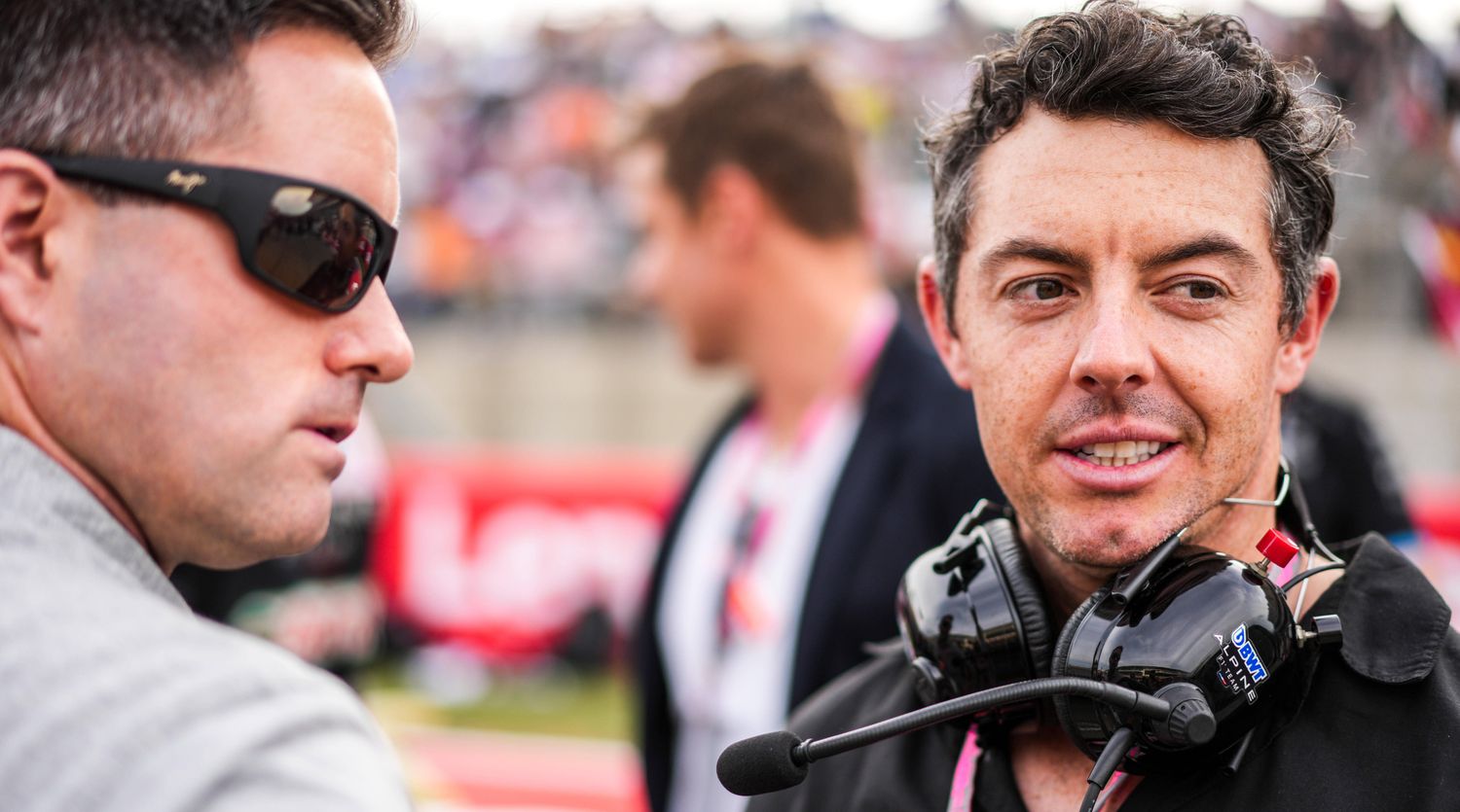 Rory McIlroy wears a headset around his neck at the U.S. Grand Prix.