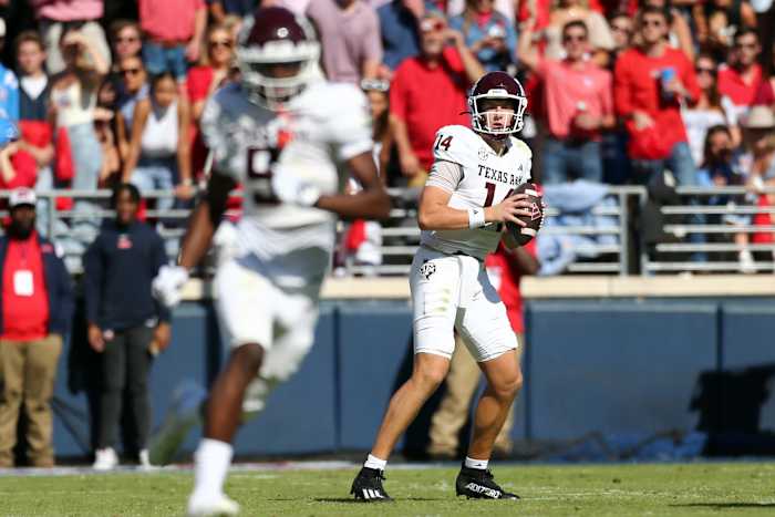 Texas A&M quarterback Max Johnson throws a pass at Vaught-Hemingway Stadium against Ole Miss
