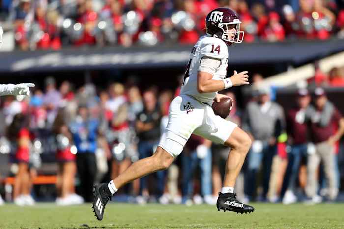 Texas A&M quarterback Max Johnson takes off for a rushing touchdown.