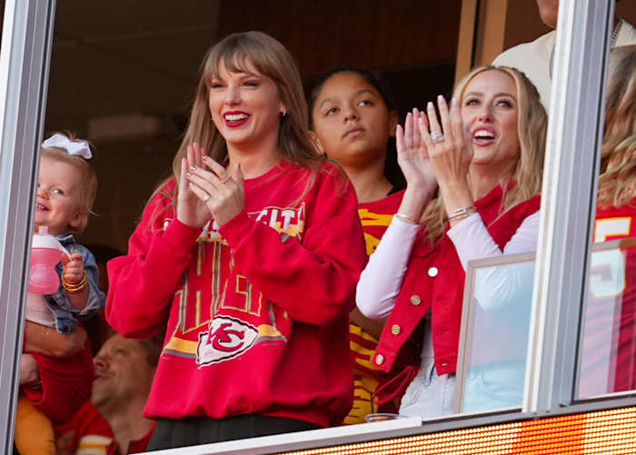 Taylor Swift and Brittany Mahomes cheer during the second half between the Los Angeles Chargers and the Kansas City Chiefs at GEHA Field at Arrowhead Stadium.