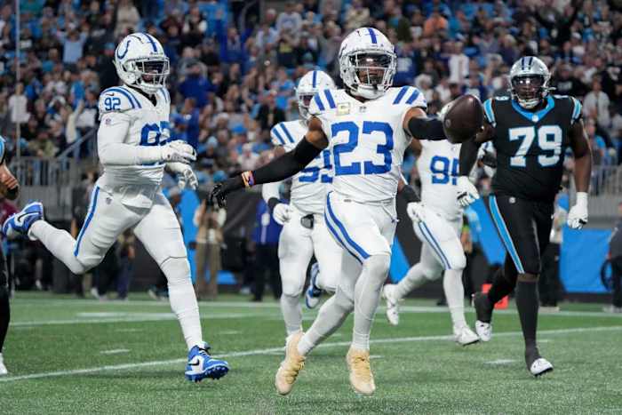 Indianapolis Colts cornerback Kenny Moore II (23) runs 49 yards for a touchdown after intercepting a pass by Carolina Panthers quarterback Bryce Young (9) on Sunday, Nov. 5, 2023, during a game against the Carolina Panthers at Bank of America Stadium in Charlotte.