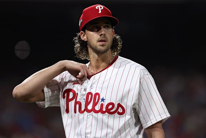 Oct 17, 2023; Philadelphia, Pennsylvania, USA; Philadelphia Phillies starting pitcher Aaron Nola (27) walks to the dug out after the inning against the Arizona Diamondbacks in the fourth inning for game two of the NLCS for the 2023 MLB playoffs at Citizens Bank Park. Mandatory Credit: Bill Streicher-USA TODAY Sports
