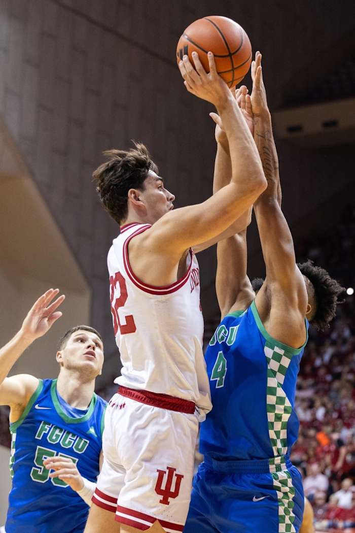 Indiana Hoosiers guard Trey Galloway (32) shoots against Florida Gulf Coast Eagles guard Cyrus Largie (4).